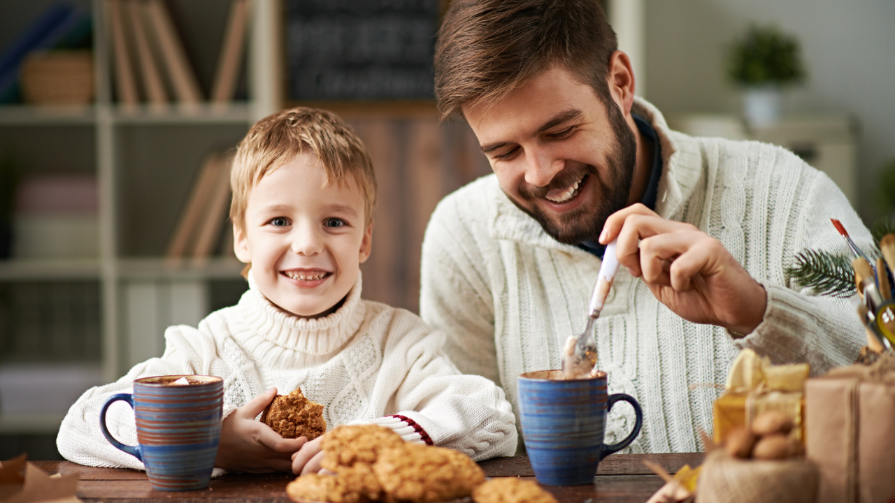 father spending Christmas time with his children at home, holiday co-parenting tips for separated fathers